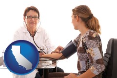 california map icon and a female nurse practitioner checking a patient's blood pressure