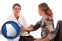 georgia map icon and a female nurse practitioner checking a patient's blood pressure