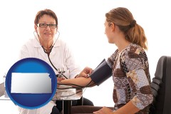 kansas map icon and a female nurse practitioner checking a patient's blood pressure