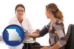 missouri map icon and a female nurse practitioner checking a patient's blood pressure