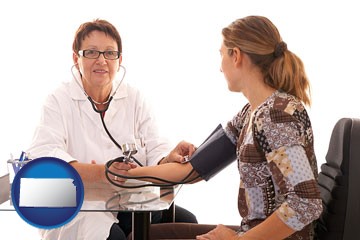 a female nurse practitioner checking a patient's blood pressure - with Kansas icon